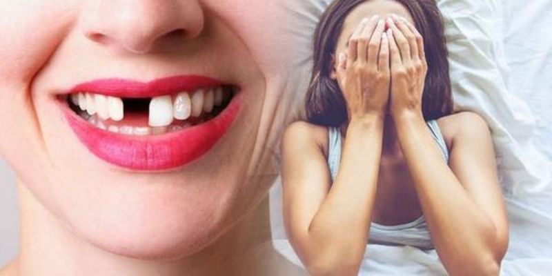 Hình ảnh mơ thấy rụng răng cửa nhưng miệng đầy tiền vàng thay thế – biểu tượng tài lộc hoàn hảo